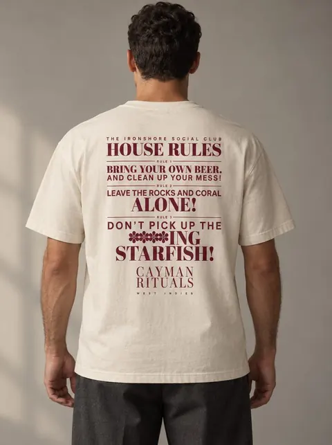 Studio render of a Cayman Rituals bone-coloured shirt, with the Ironshore Social Club house rules printed on the back